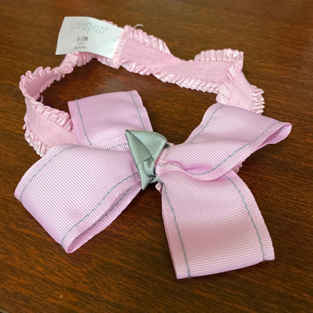 Pink hair bow on hair band